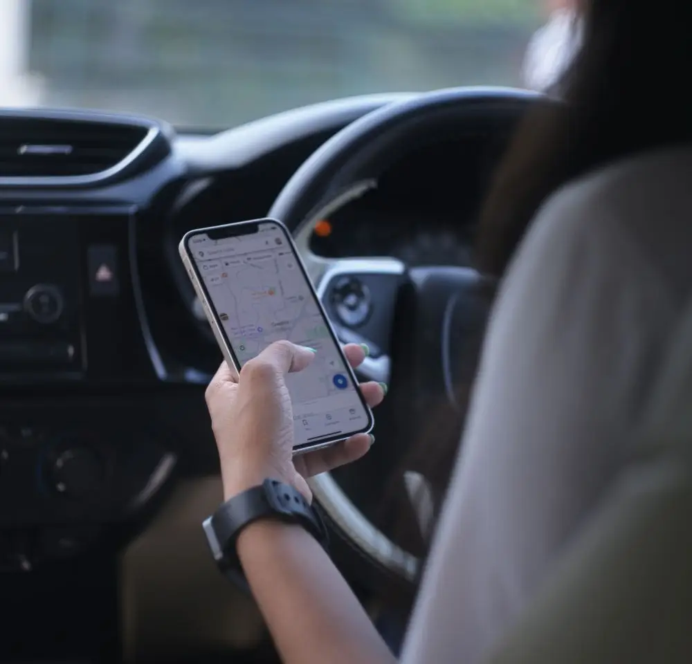 Woman on phone in car